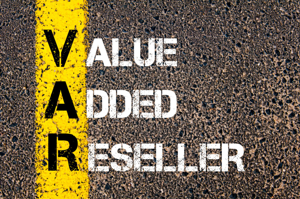 value-added reseller is written on the road next to a yellow line