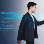 Asian business owner looking at customer reviews on his company