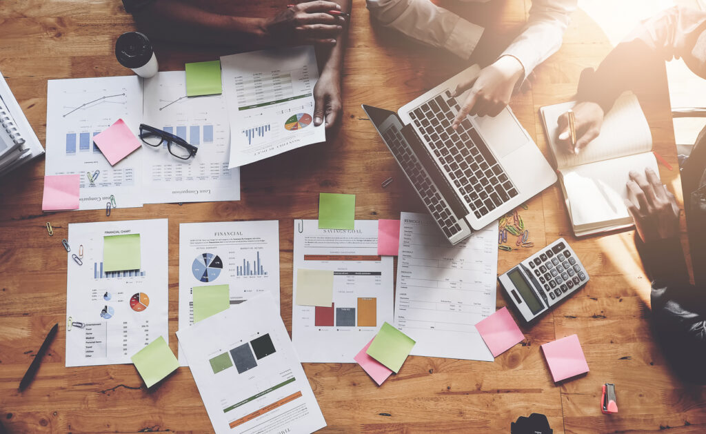 Table showing sales team performance through charts and notes