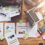 Table showing sales team performance through charts and notes