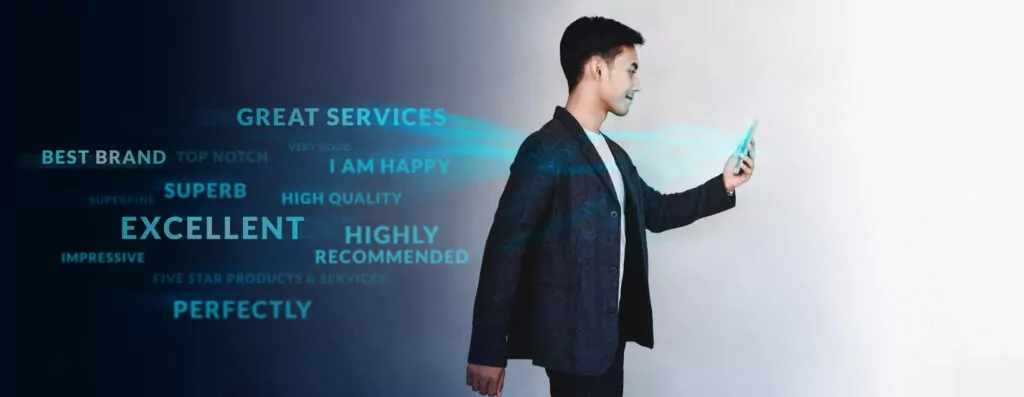 Asian business owner looking at customer reviews on his company